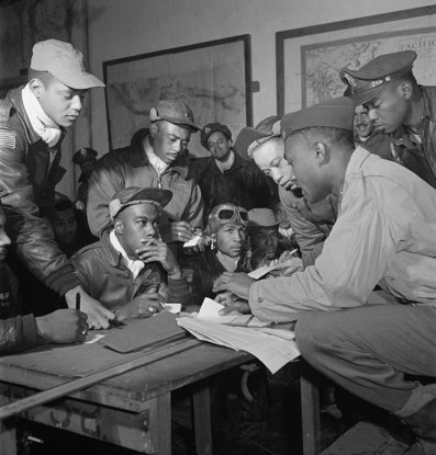 Tuskegee Airmen of the 332nd Fighter Group at a mission briefing in Italy, 1945